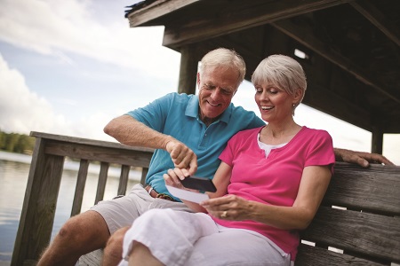 Couple making a remote deposit.